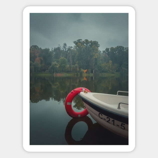 boat on the lake Sticker by psychoshadow